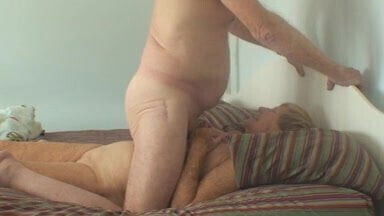 Grandpa and grandma enjoys on bed