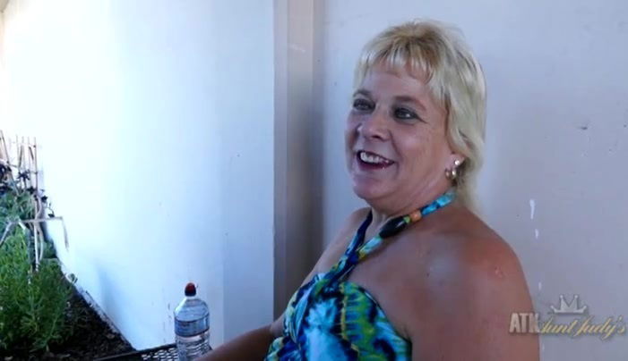 Trashy smokes cigarette outdoors