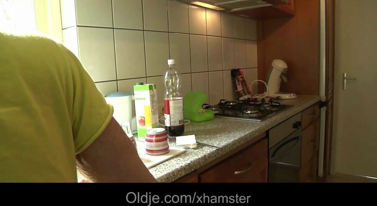 Big old dick fucks young tall brunette in the kitchen