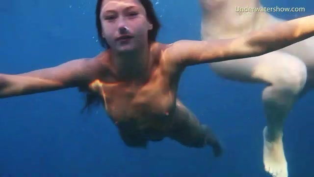 lean naked bodies underwater ocean