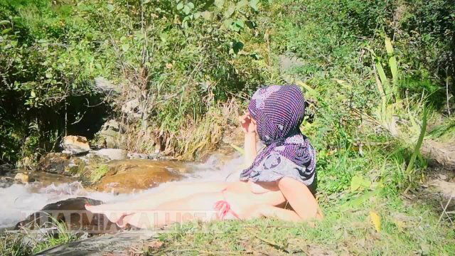 Shameless Muslim slut topless hijab Smoking nature