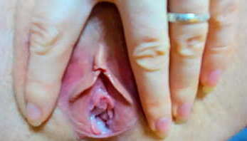 Beautiful Laverna Queen shows her pussy.