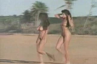 Two nudist beach babes