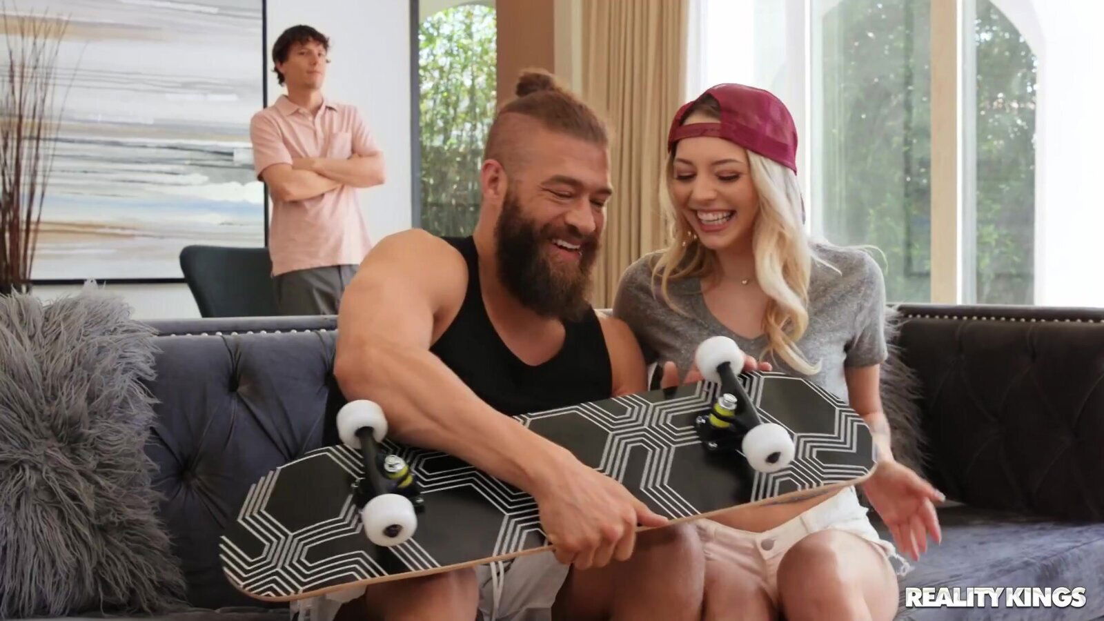 Adorable skater girl pleasuring Xander living room