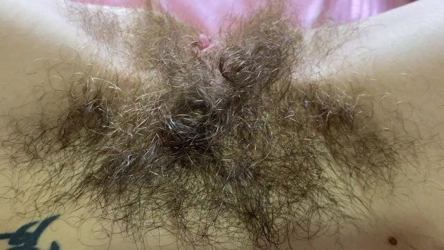 Hairy pussy clit closeup
