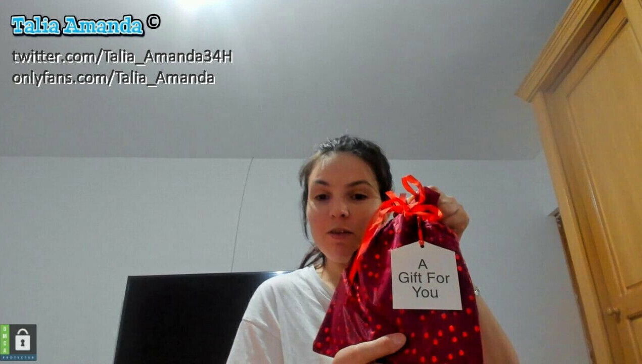 Talia Amanda unpacking presents