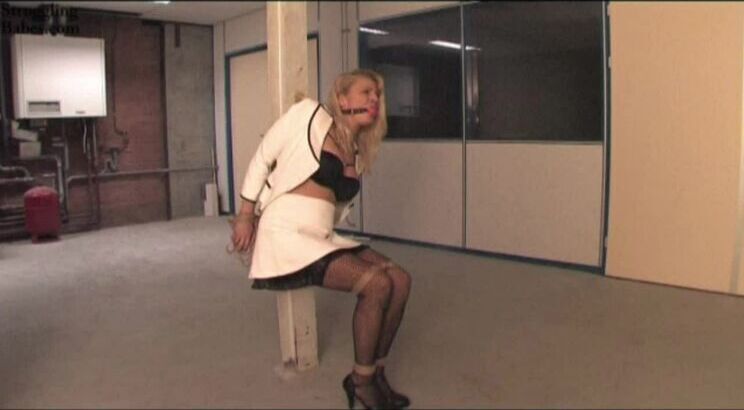 Adrienne pole-tied ballgagged