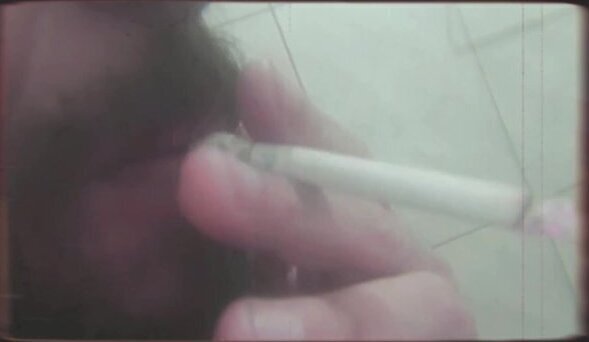Bearded smoking shaving pubic hair