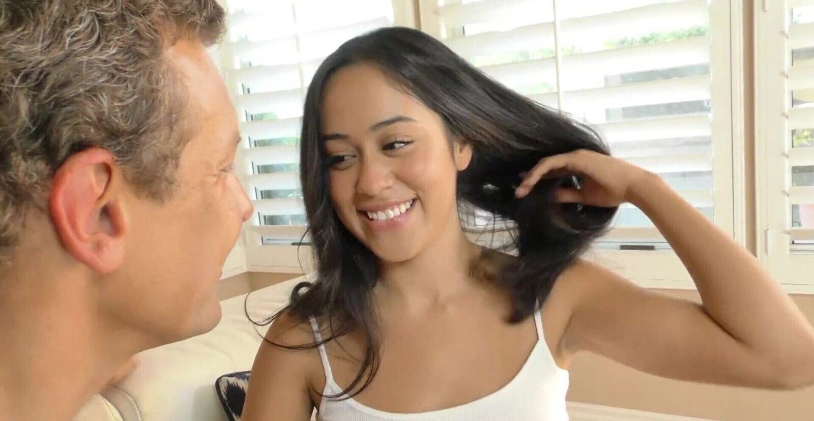 Dania Vega moans while being spanked during