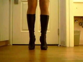 Bending hard and trying to break the high heels boots