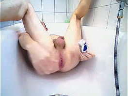 Enema and anal playing with a red bull can