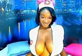 Ebony nurse with huge 