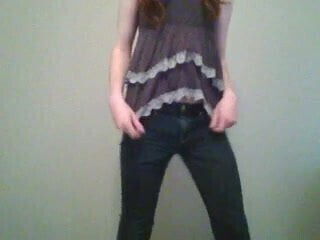 Trap in skinny jeans and revealing top