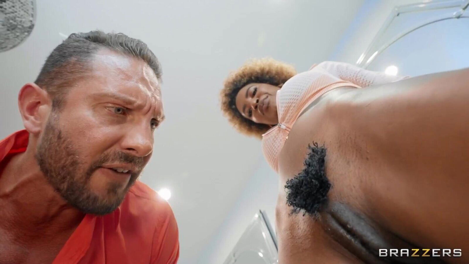 Curly-haired ebony with fake boobs shares hard knob with bestie