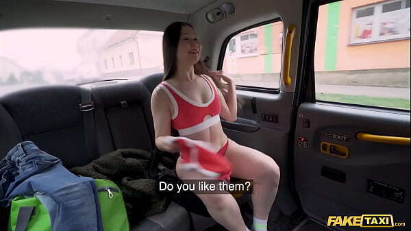 Fake Taxi Horny Asian MILF strips into outfit before riding