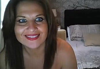 Sexy Milf teases and squeezes natural pair 