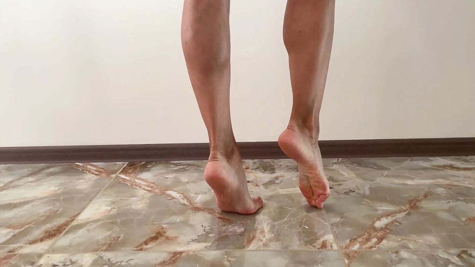 Slim girl shows long sexy legs