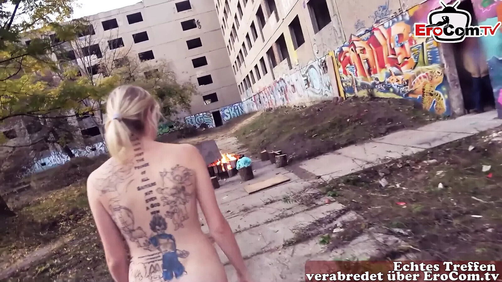 German blonde with small tattoos during outdoor date
