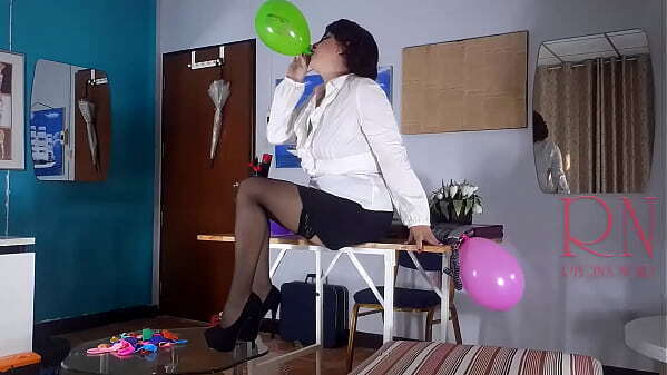 Office Obsession, secretary Inflatables balloons masturbates with balloons.