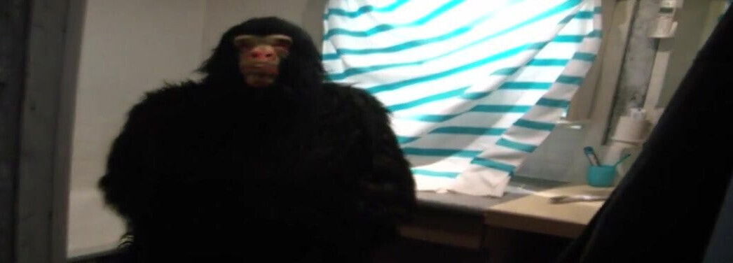 rubber guy wanking in monkey suit