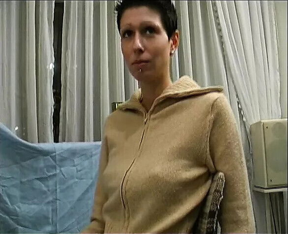 Short haired teen fisting herself