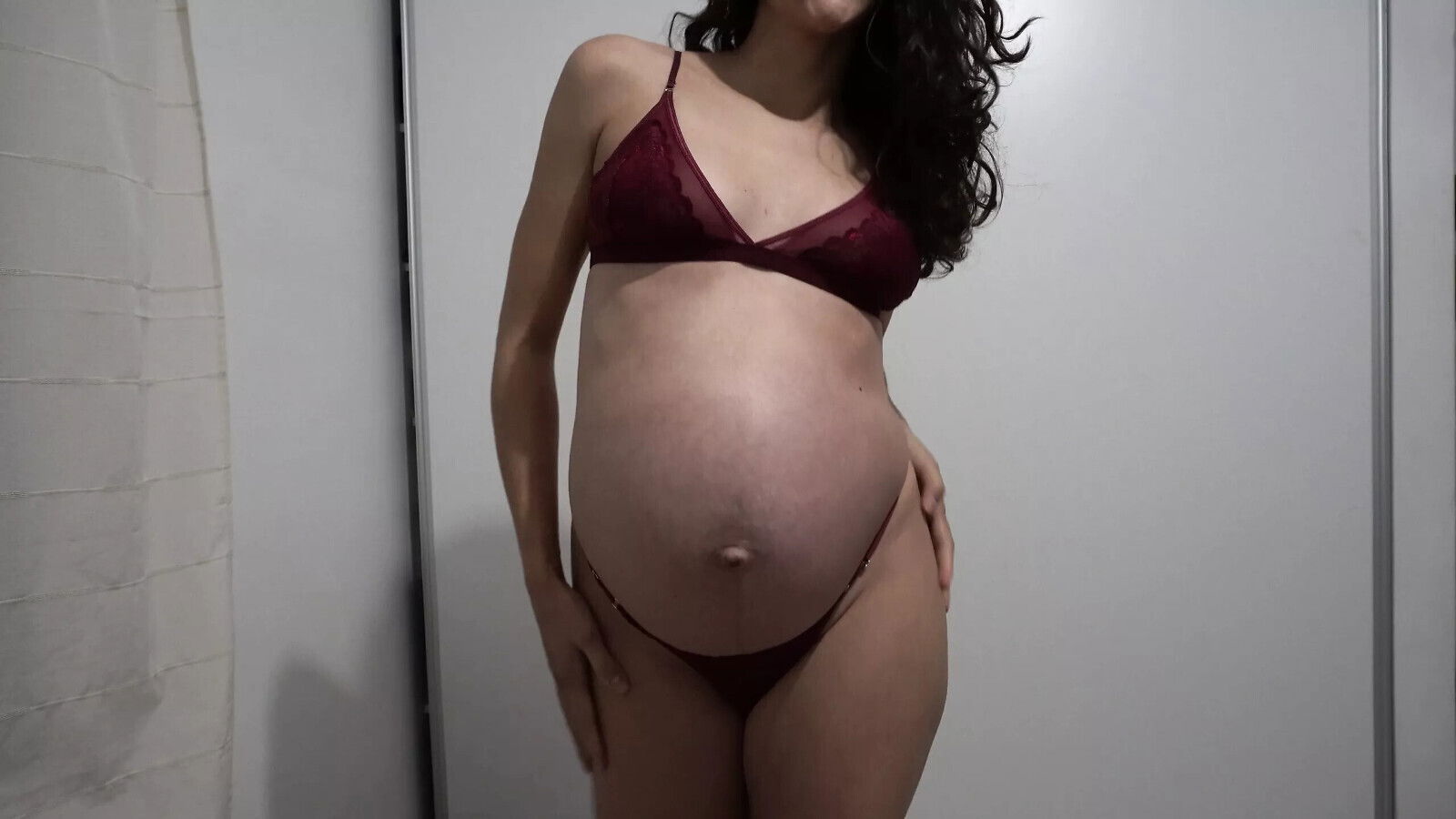 Pregnant Latina MILF trying sexy lingerie