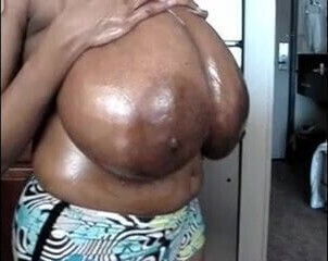 HUGE BLACK BREASTS