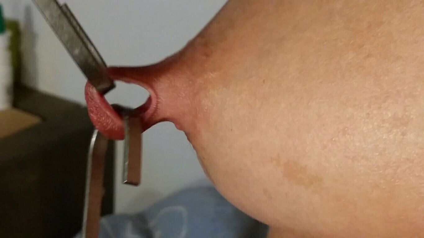 nippleringlover horny milf stretching nipple piercings with hooks 17mm close