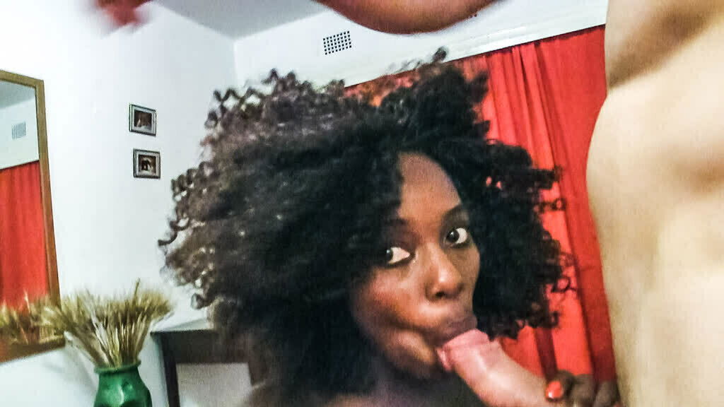 Beautiful ebony model quickly peeks while taping video