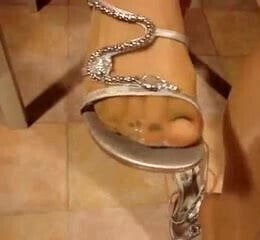 Awesome teaser and footjob from blonde Milf