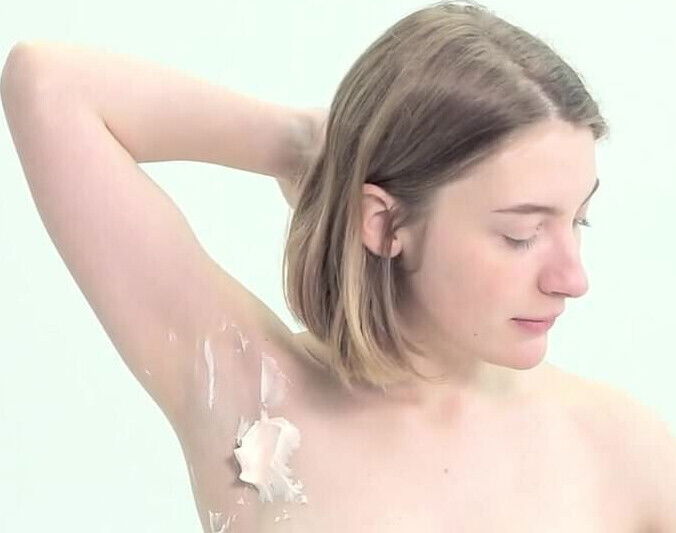 Sweet school girl shaving herself