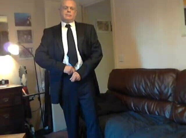 Wank in suit