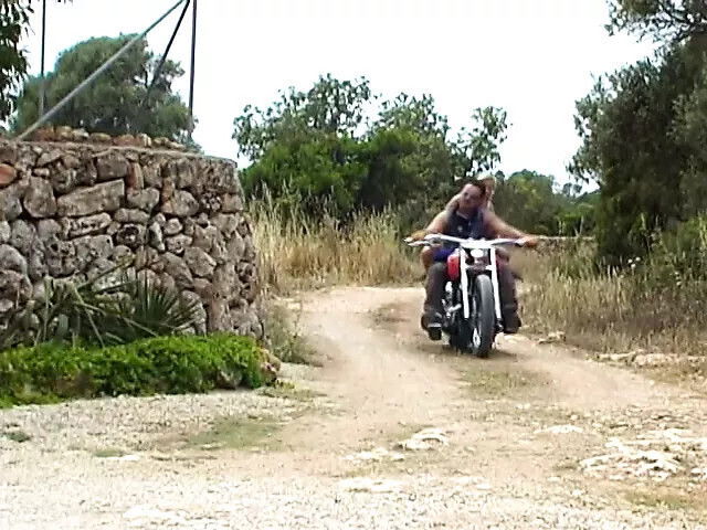 Biker stud fucks blond MILF outside