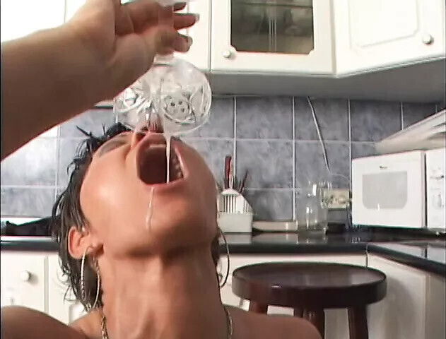 Beautiful euro slut drinks from glass after getting fucked