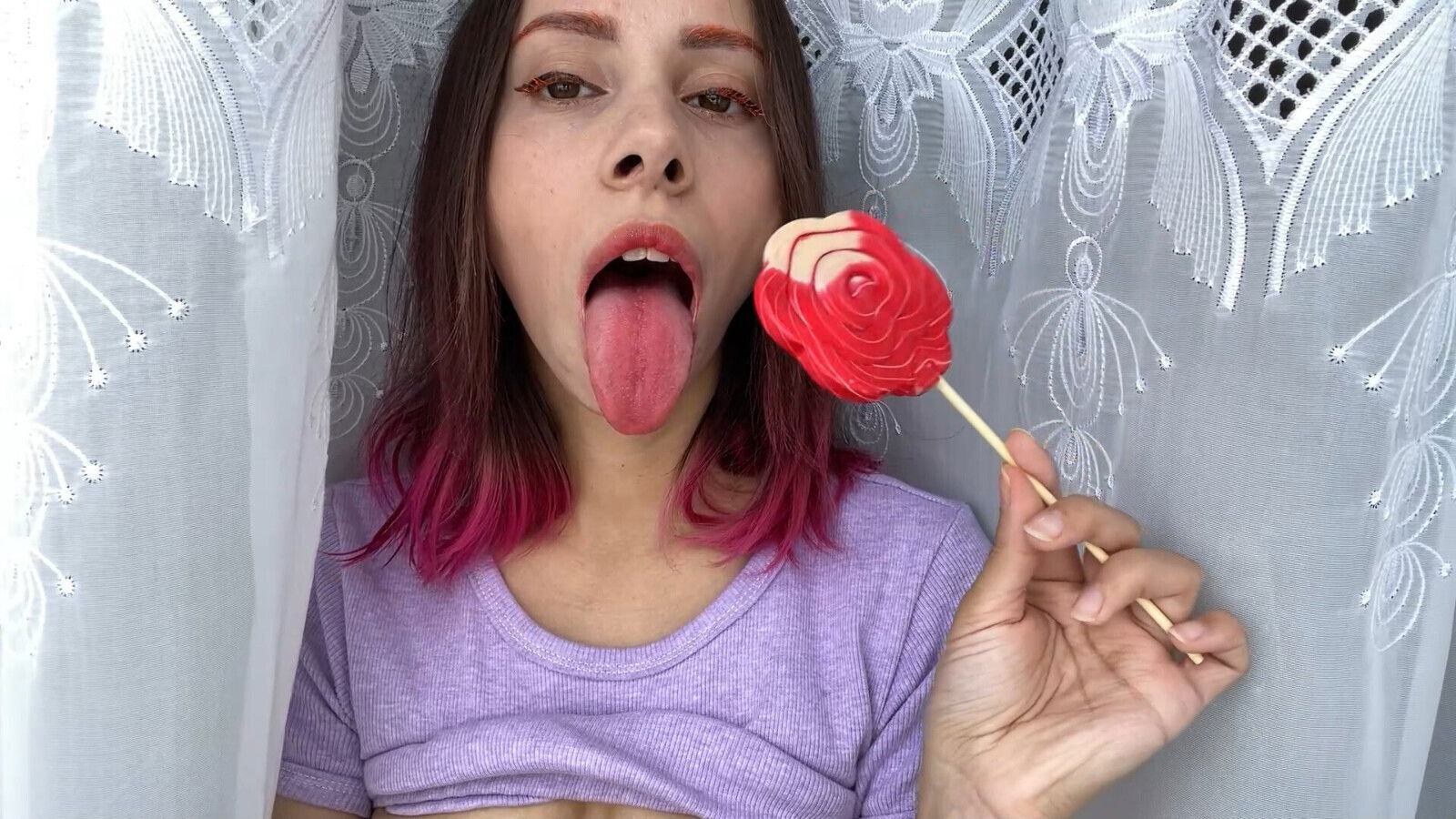 Naughty stepsister sucks lollipop shows long sexy tongue