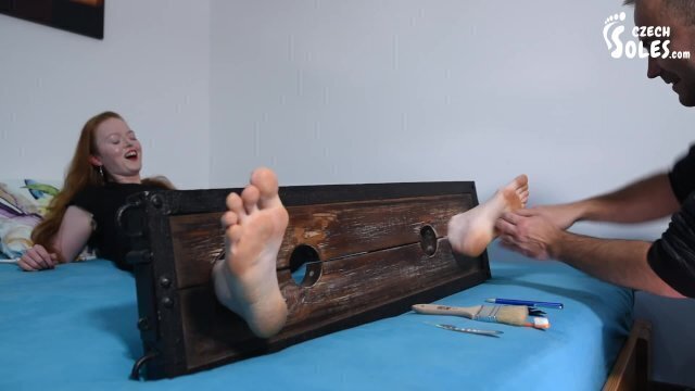 Merciless tickling bare feet (foot tickling, stocks, feet, bare soles, foot torture)