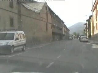 driving nude in the car in the city 