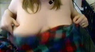 Amateur blonde shows her big pale tits