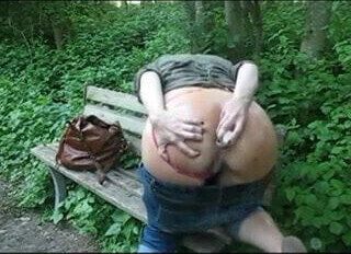 Slut having anal dildo fun outside 