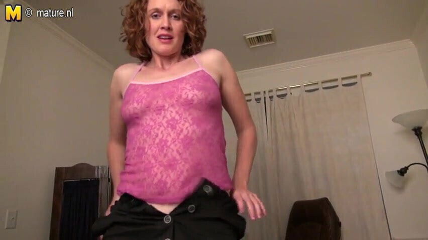 Horny American playing with shaved pussy