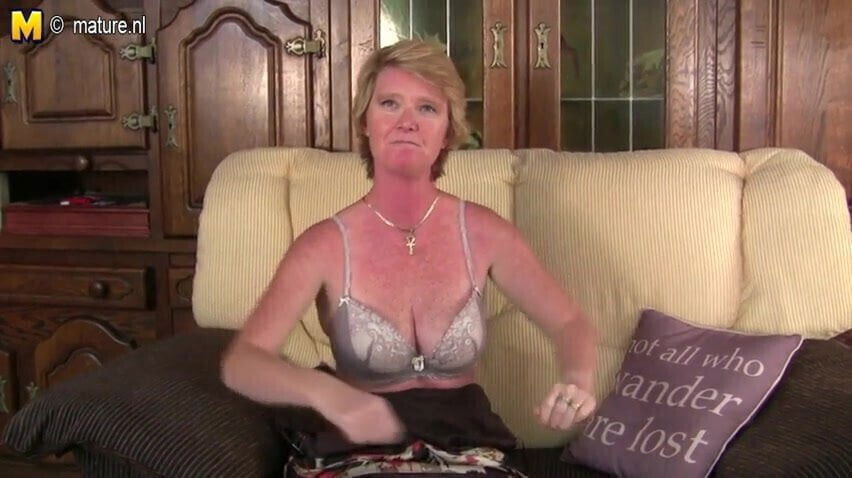 Naughty British mature playing with pussy