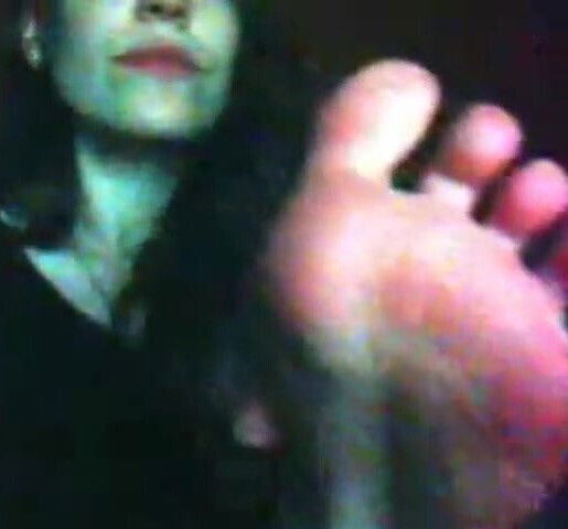 French amateur girl licks her own foot on cam