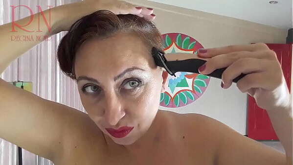 Naked nudist hairdresser. cuts hair. Regina Noir Camera selfie