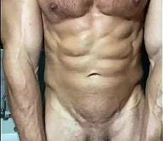 Another model loves to play his big pecs and shows us something else quite big!