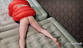 Inflatable Mattress Humping Wearing Overfilled Down Puffer Jacket.