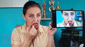 Lips teasing with lipstick. lipstick kissing teasing Regina Noir.