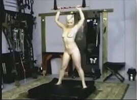 slave Tasia Lockran doing Static Trapeze