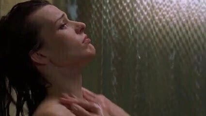 Milla Jovovich gets kissed Shower