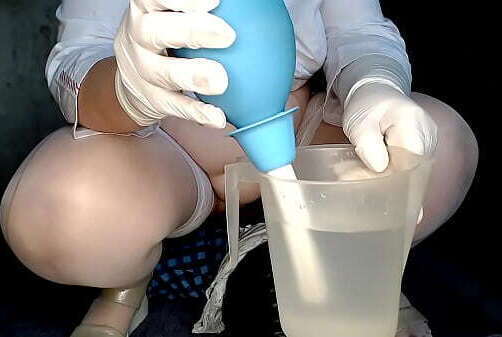 Enema nurse'_s vagina over patient'_s face