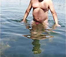 Thongslut dips in the water